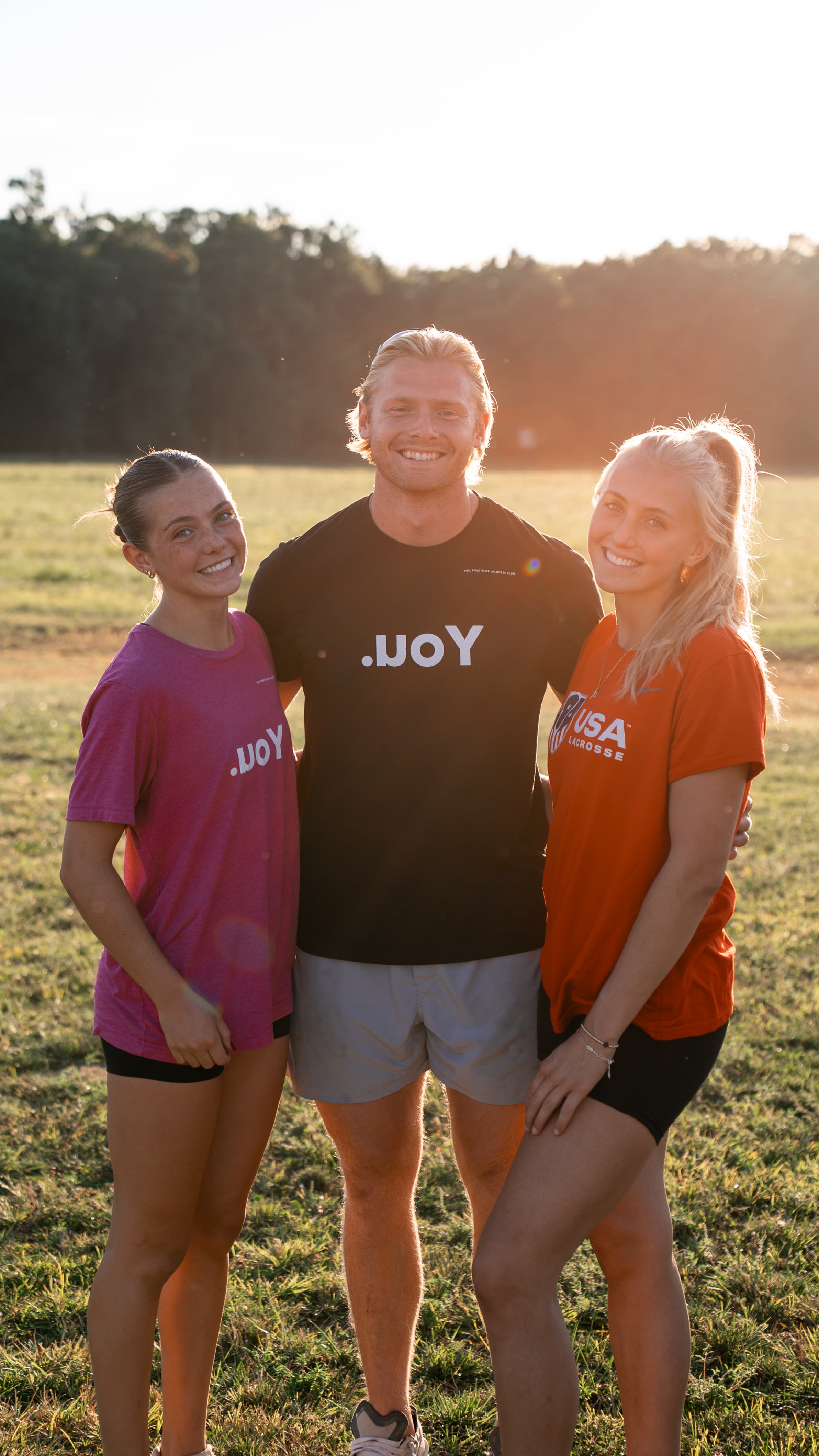 Athletes at golden hour wearing .uoY