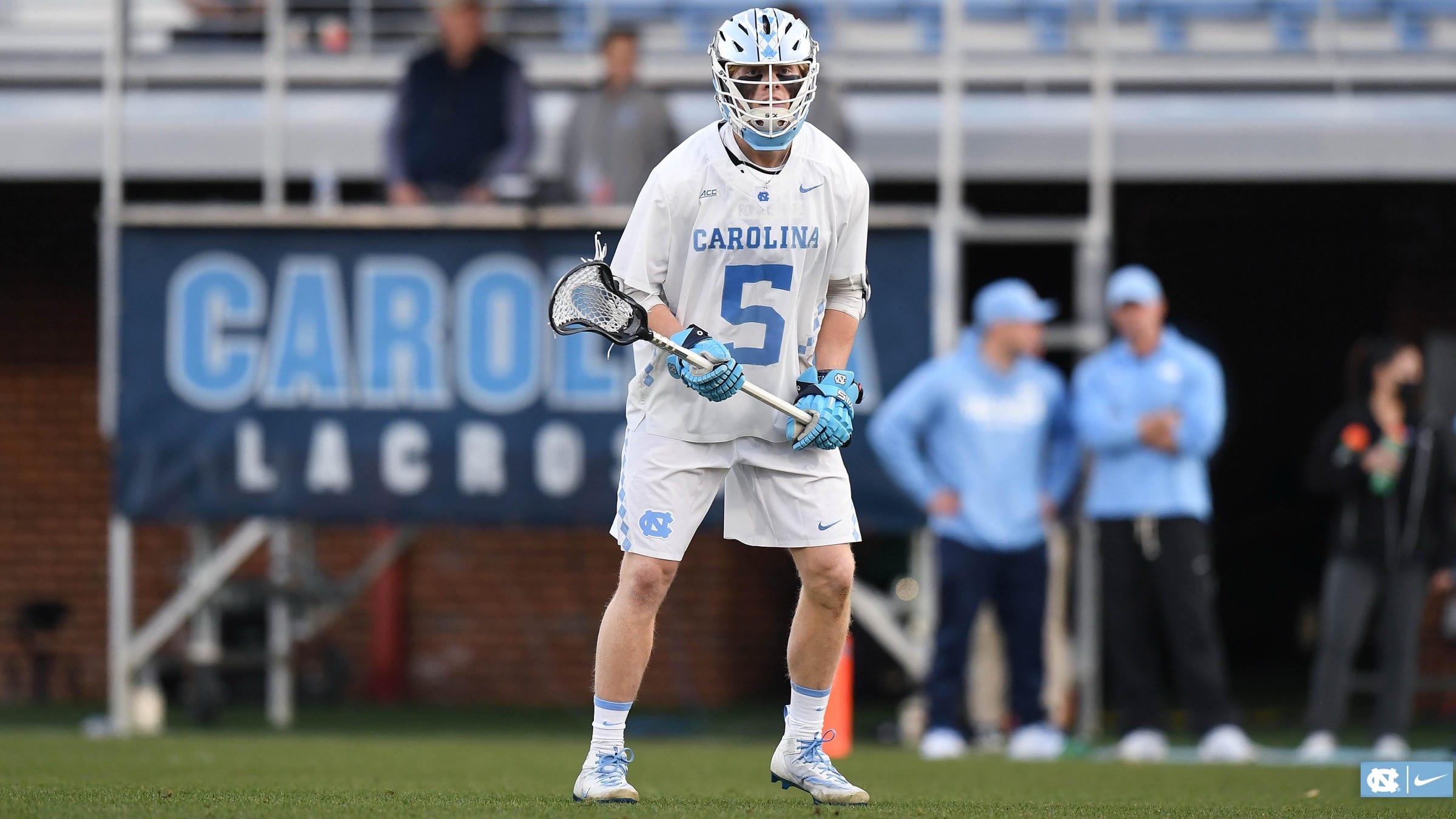 A college lacrosse player mid-game